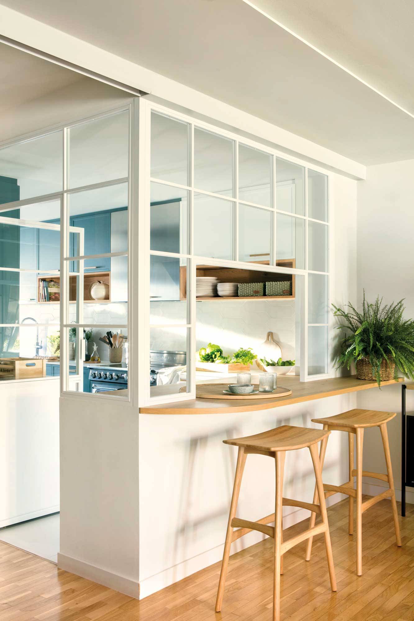 Cocina con cerramiento de cristal. 
